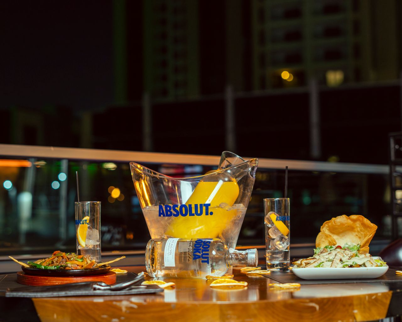 gallery-1 Night scene featuring cocktails and dinner at a rooftop in Erbil, Iraq.